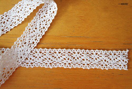NO.6 cotton lace trim displayed on a sewing table.