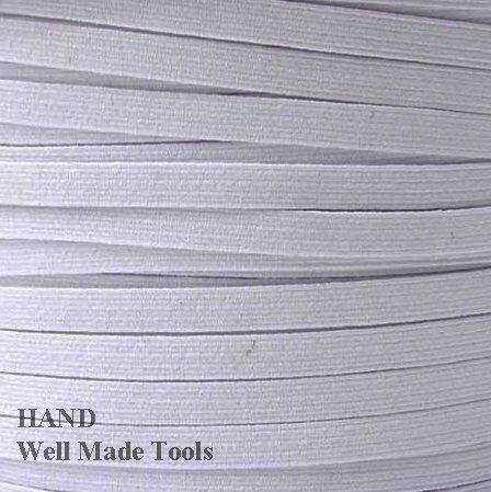 Close-up of 12mm wide white sewing elastic for crafting