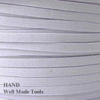 20 metres of white polyester woven sewing elastic on a spool