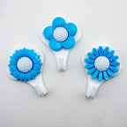 Close-up of a blue sunflower self-adhesive hook on a wall