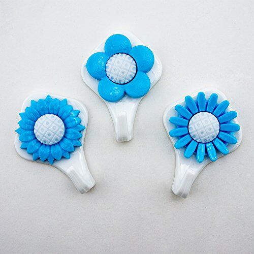 Close-up of a blue sunflower self-adhesive hook on a wall