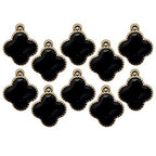 Black enamel four petal flower embellishment on a white background.