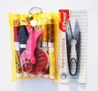 Assorted threads and needles in a well-presented sewing kit