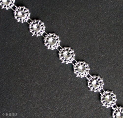 Close-up of Pretty Small Flowers Silver Trim showing intricate floral design.