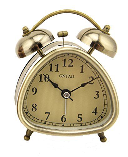 Triangle-shaped vintage style alarm clock in metallic finish.