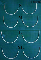 Close-up of a single plastic bra under wire for corsetry use.