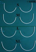 Five pairs of size S plastic bra under wires displayed together.