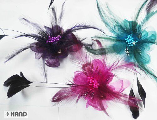 Three assorted cute flower headdresses displayed together.