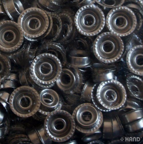 15 mm silver press stud buttons showing front and back view.