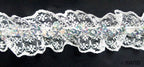 Nylon sequin lace elastic trim in white on a roll