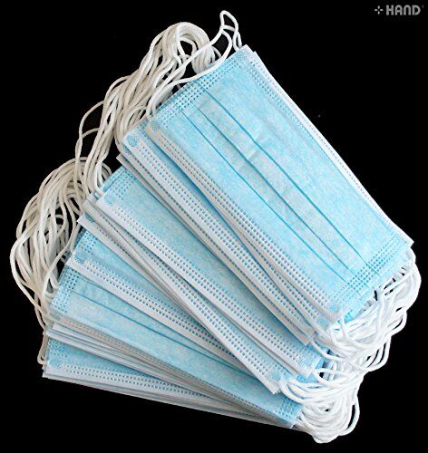 Close-up of a 3 ply disposable face mask showing layers