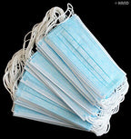 Close-up of a 3 ply disposable face mask showing layers