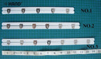 Close-up of the straight design of the corset fastener.
