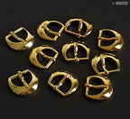Close-up of a polished gold tone D shape buckle measuring 1.6cm