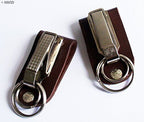Two leather wide belt loop hook keyring buckles displayed together.