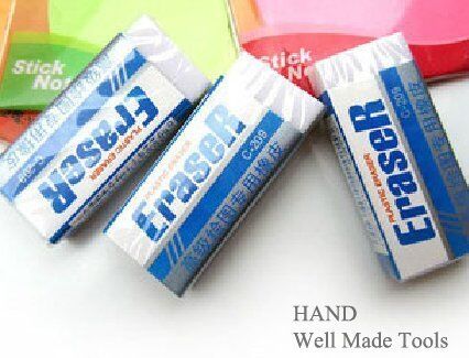 Close-up of a large graphic office block eraser showing its texture.