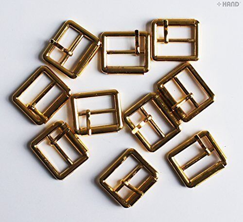 Close-up of a gold tone metal shoe buckle, 20mm size.