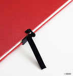 Open sketch book showing off white textured 120gm paper.