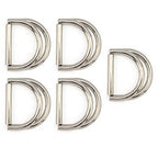 Large silver metal D-ring buckle on a white background