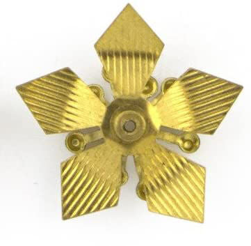 Display of angled leaves flower trims on a fabric background