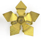 Display of angled leaves flower trims on a fabric background
