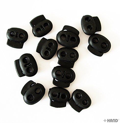 Black plastic toggle spring stop cord lock in use with string