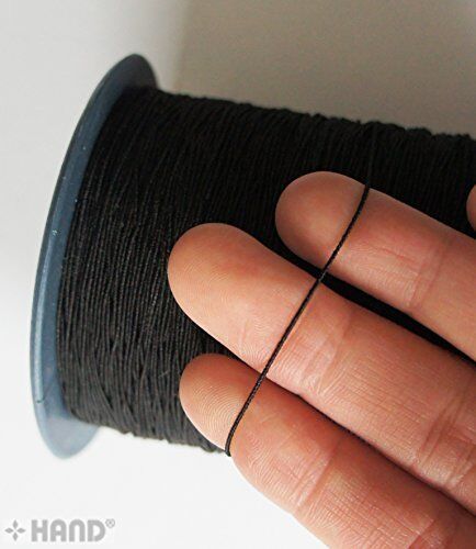 Measuring 900 metres of black shirring elastic on a spool