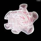 Close-up of white decorative flower trim
