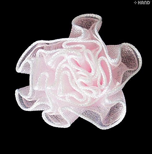 Close-up of white decorative flower trim