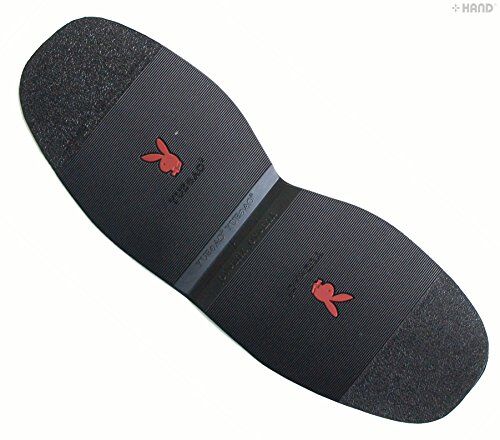 Shoe repair pads being applied to a shoe sole