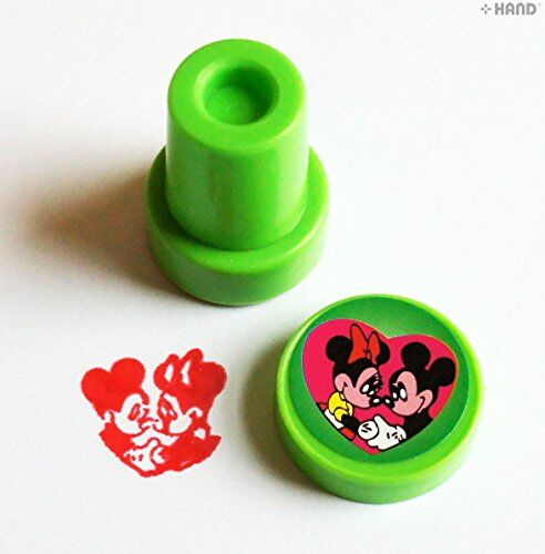 Kids using Mickey and Minnie Mouse rubber stamps