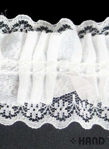 Black elastic lace trim used in a crafting project