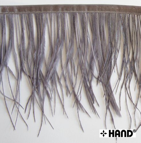 Close-up of gun grey ostrich feather fringe showing stitching detail.