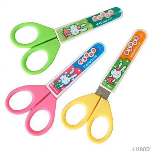 Children using colourful scissors for craft activities