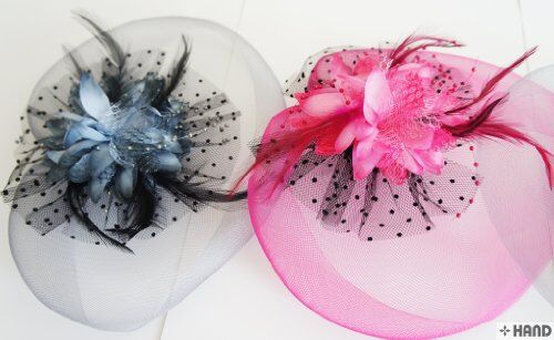 Close-up of a flower net feather accessory in vibrant colours