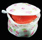 Various bras placed inside the bra wash bag for washing