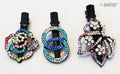 Three assorted design hair clips with shiny diamante details.