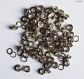 Pack of silver 4mm eyelets grommets for sewing projects.