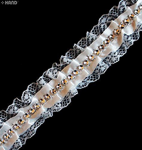 Close-up of T24 white lace ribbon showing intricate design.