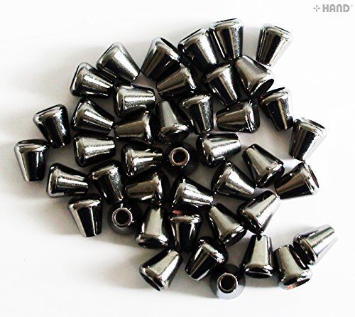 Close-up of dark copper tone cord fastener ends on a white background