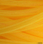 Full roll of yellow tubular crin trim on a white background