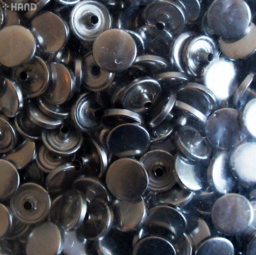 Packaging of the 4-part press stud buttons in vintage gold