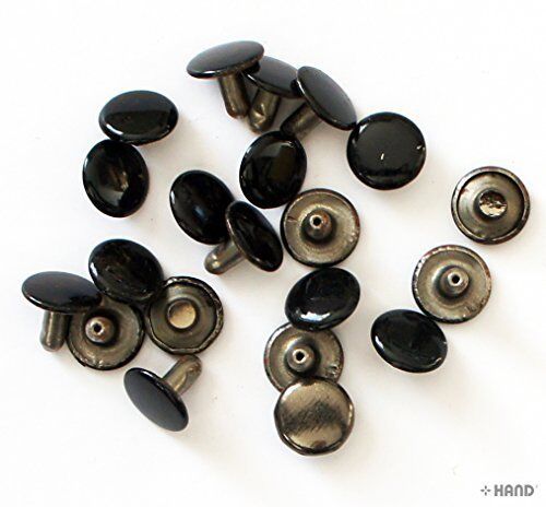 Close-up of 12 mm flat black press studs in packaging