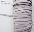 Icy White extra strength flat elastic cord spool, 4mm wide.