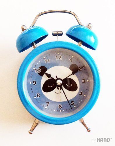 Side view showing the twin bells of the metal alarm clock