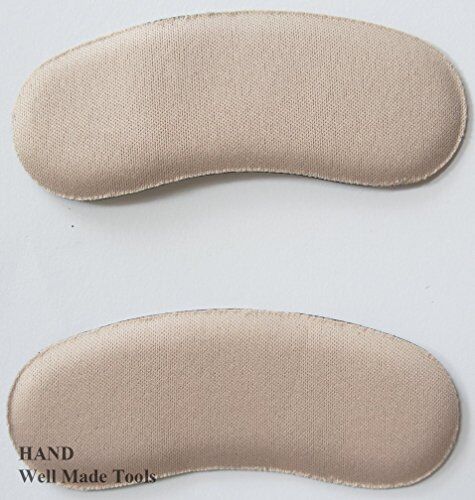 Heel grippers placed inside a pair of shoes.