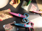 Zig zag scissors displayed with various paper crafts