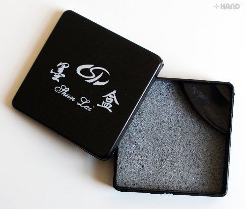 Close-up of a No.2 square ink box showing its design.