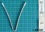 V wires displayed on a fabric background for crafting.