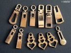 Close-up of gold zip pulls with eyelets for crafting